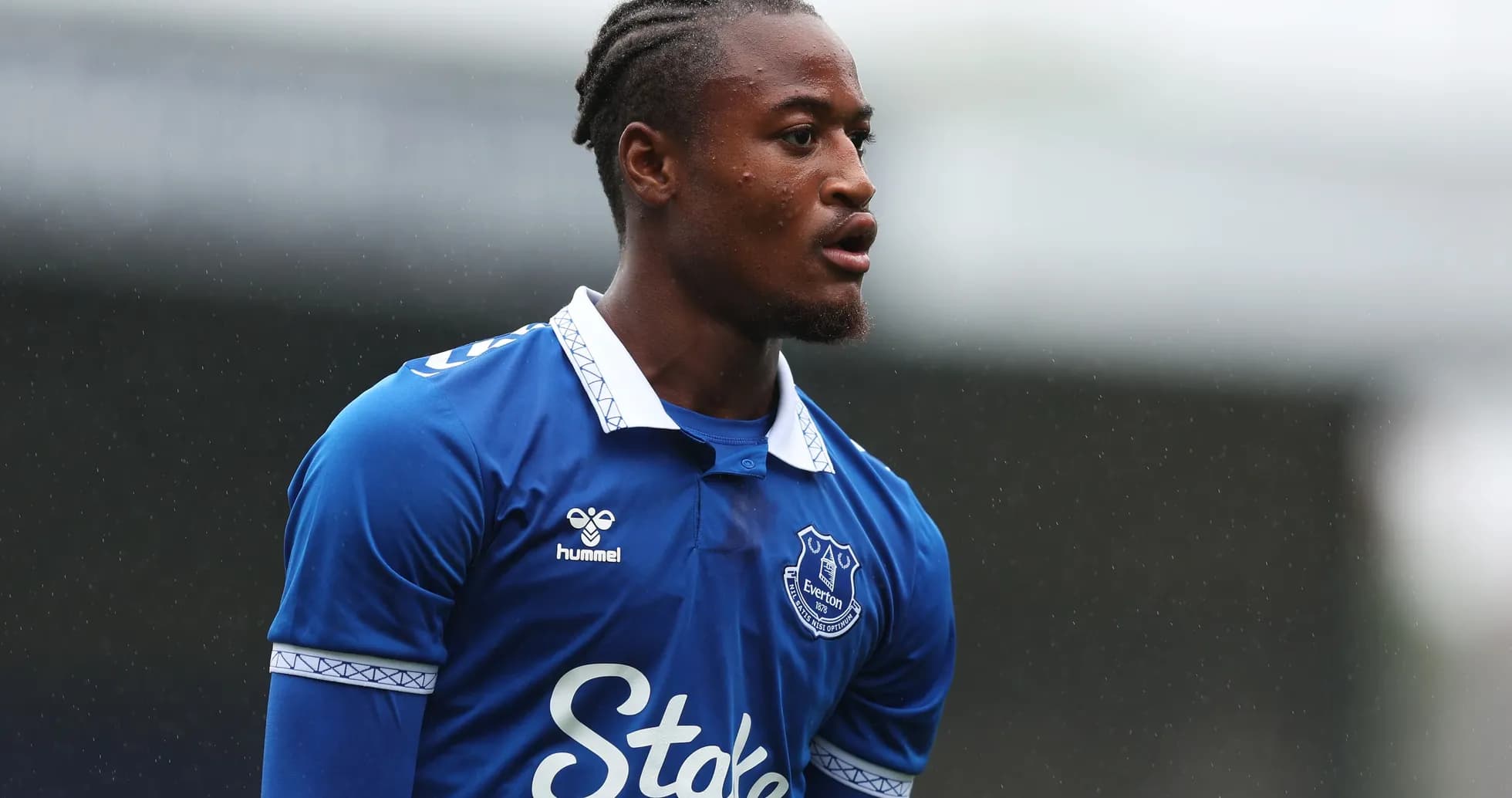 Player in blue Everton kit during match action