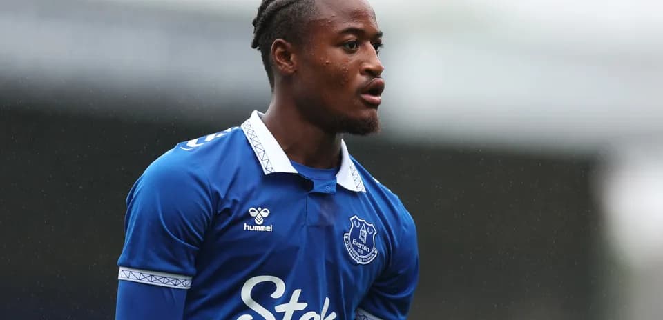 Player in blue Everton kit during match action