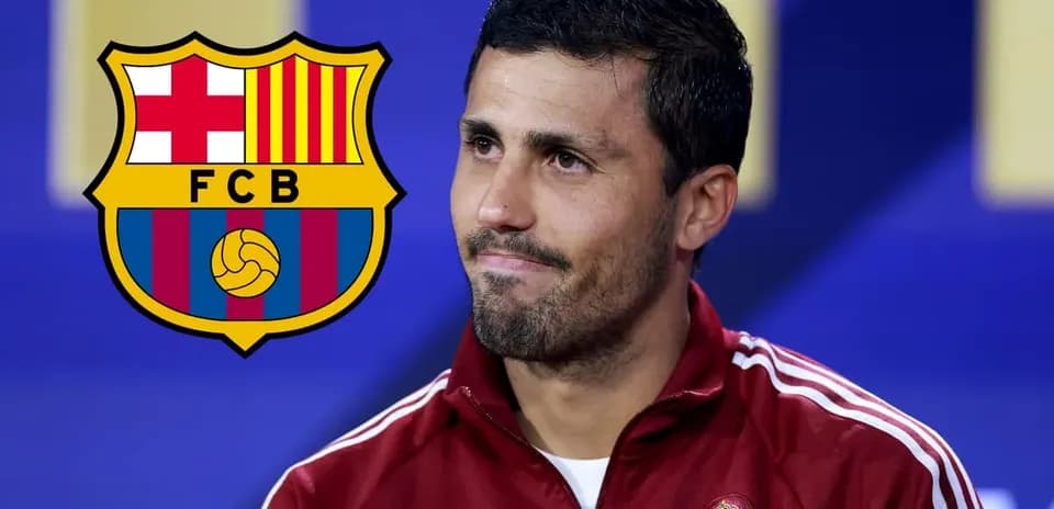 Player at press conference with FC Barcelona logo