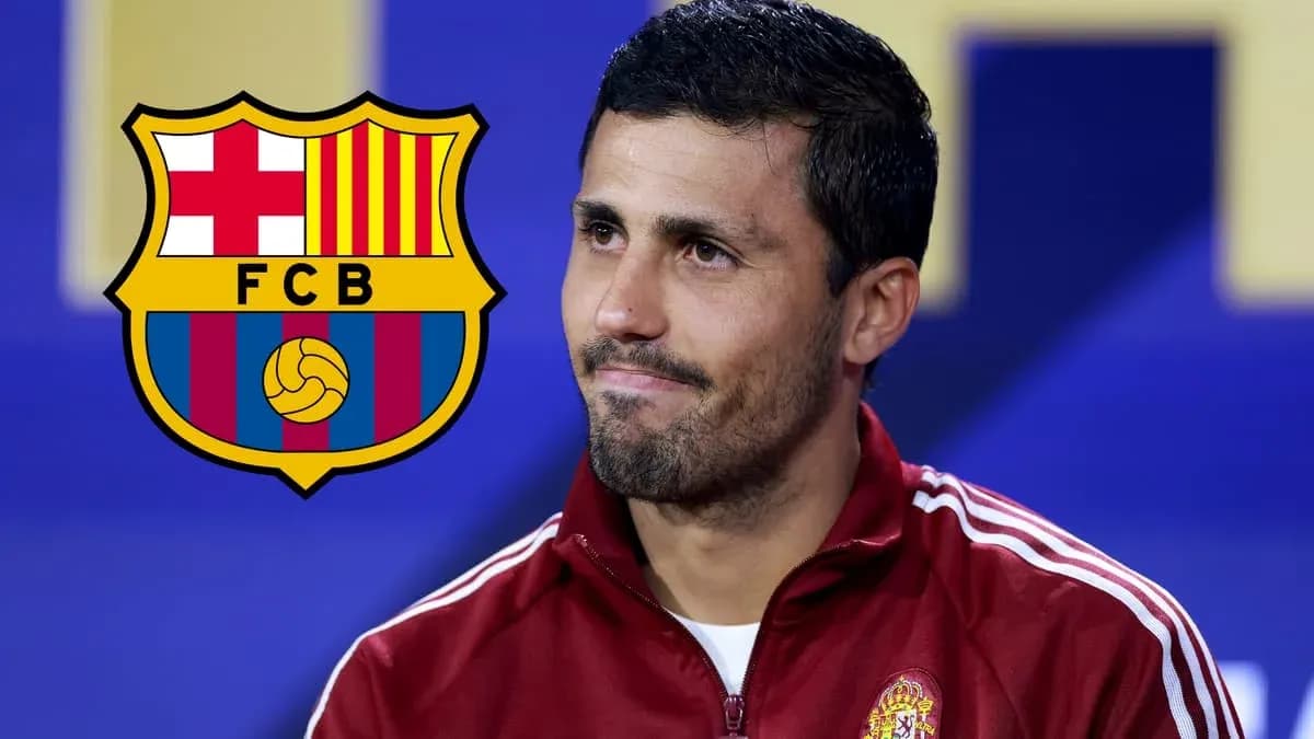 Player at press conference with FC Barcelona logo