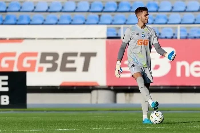 Goalkeeper practicing with ball during training session