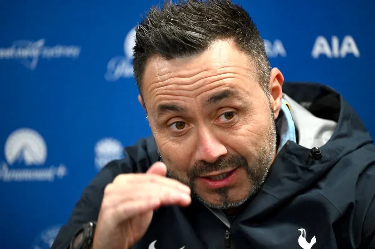 Manager speaking during press conference with gestures