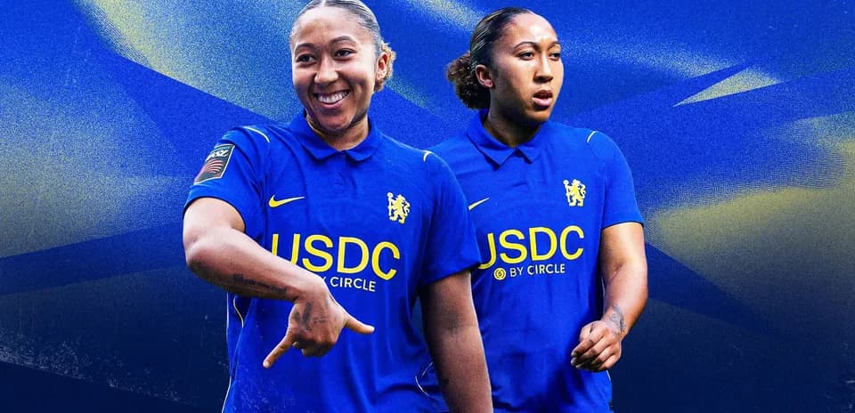 Player in blue Chelsea jersey posing for photo