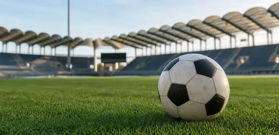 Soccer ball on grass field at stadium