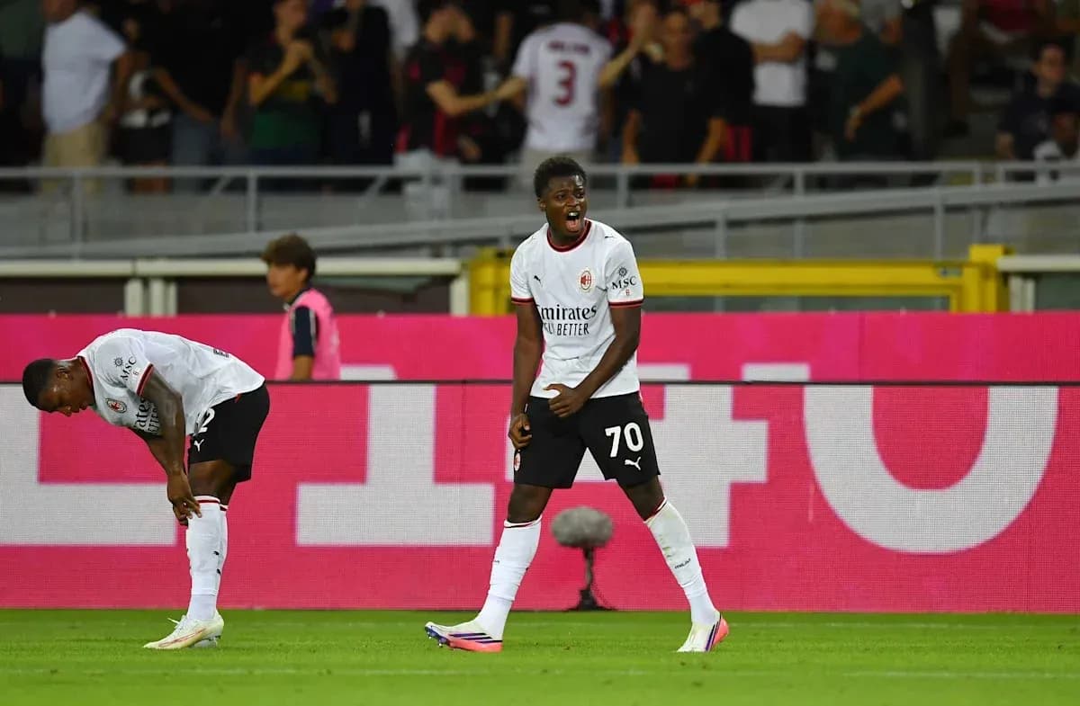 AC Milan players on the field during match celebration