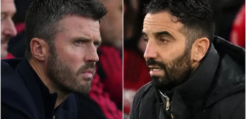 Two football managers discussing during match