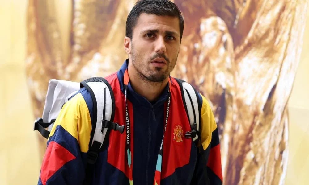 Athlete wearing team jacket with backpack indoors