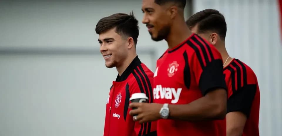 Manchester United players walking during training session