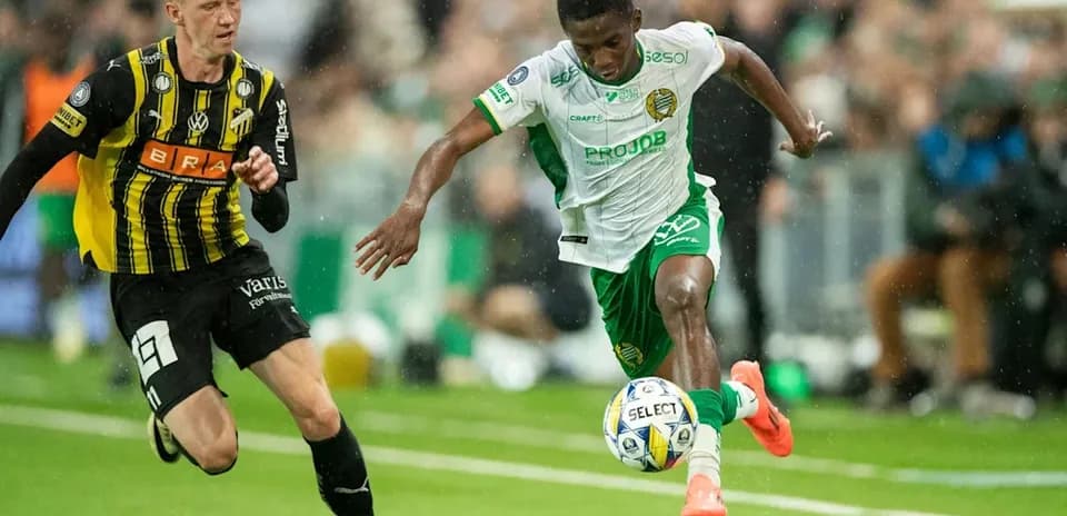 Player dribbling the ball during a football match
