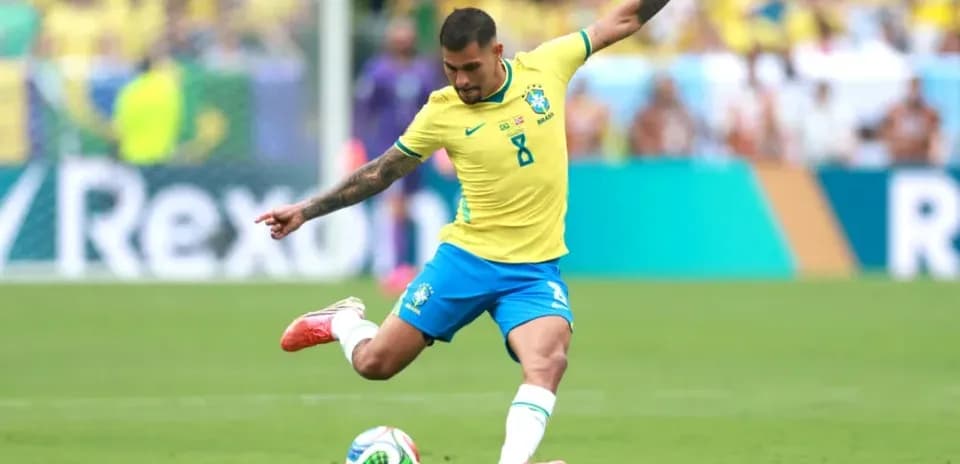Brazilian player taking a shot on goal during match