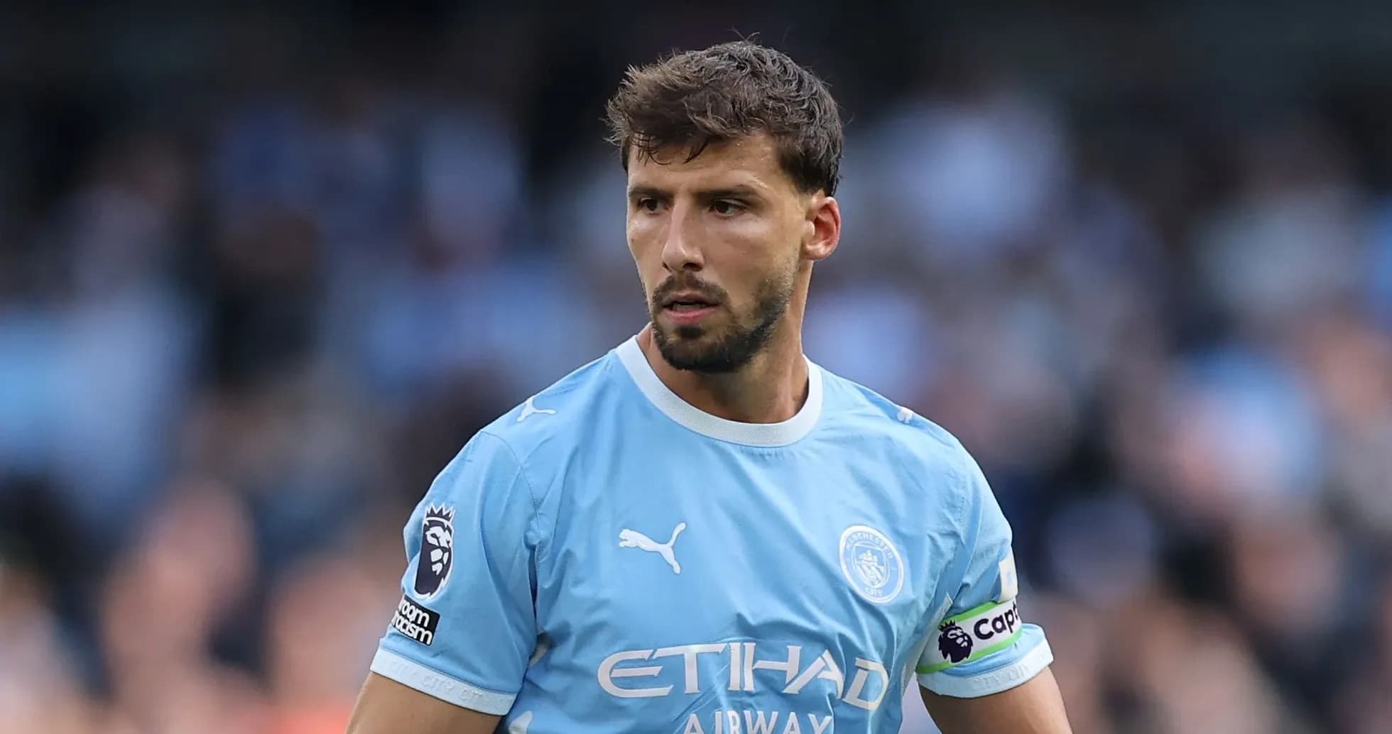 Manchester City player in light blue kit during match