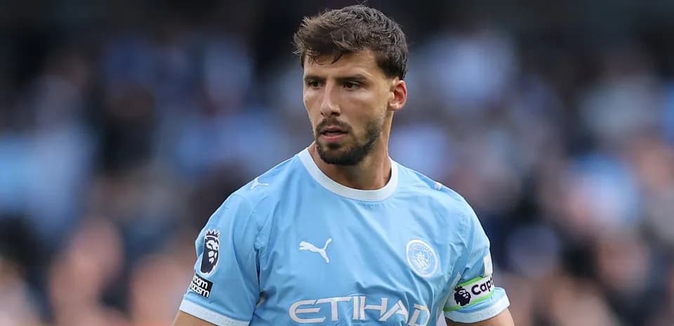 Manchester City player in light blue kit during match