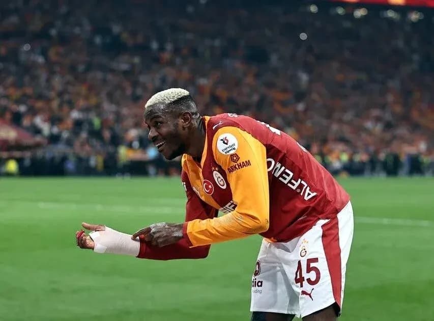 Player celebrating on the pitch during a match