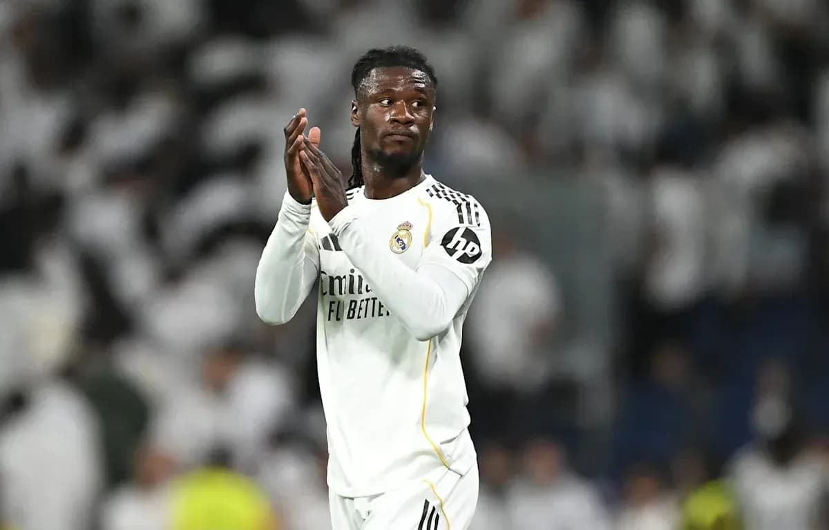 Player applauding fans during match at stadium