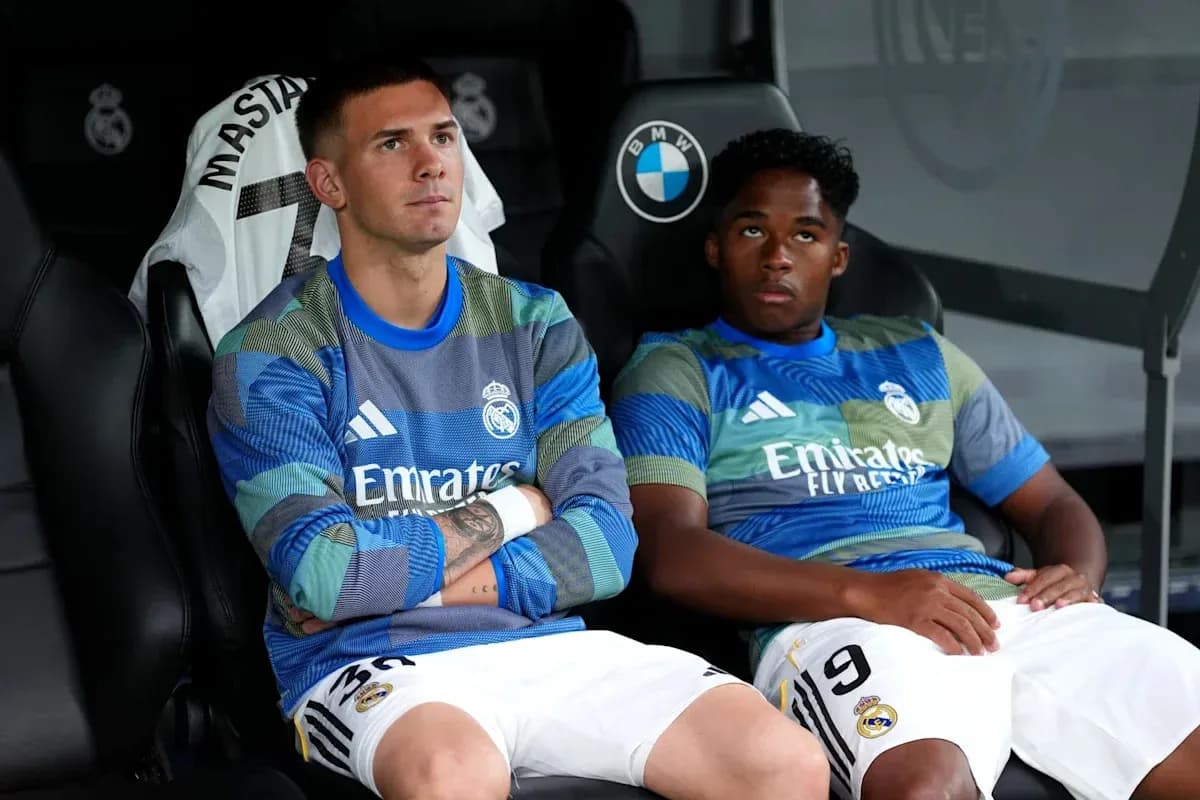 Two Real Madrid players sitting on bench