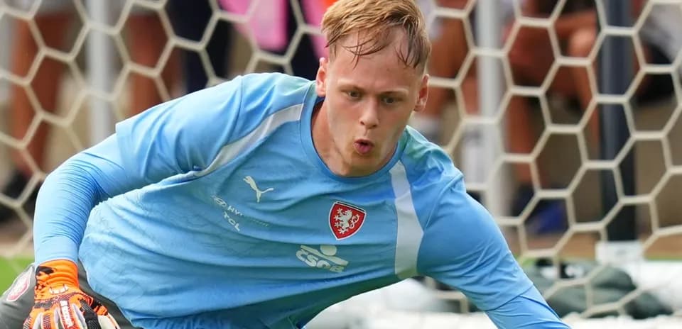 Goalkeeper diving to make a save during training