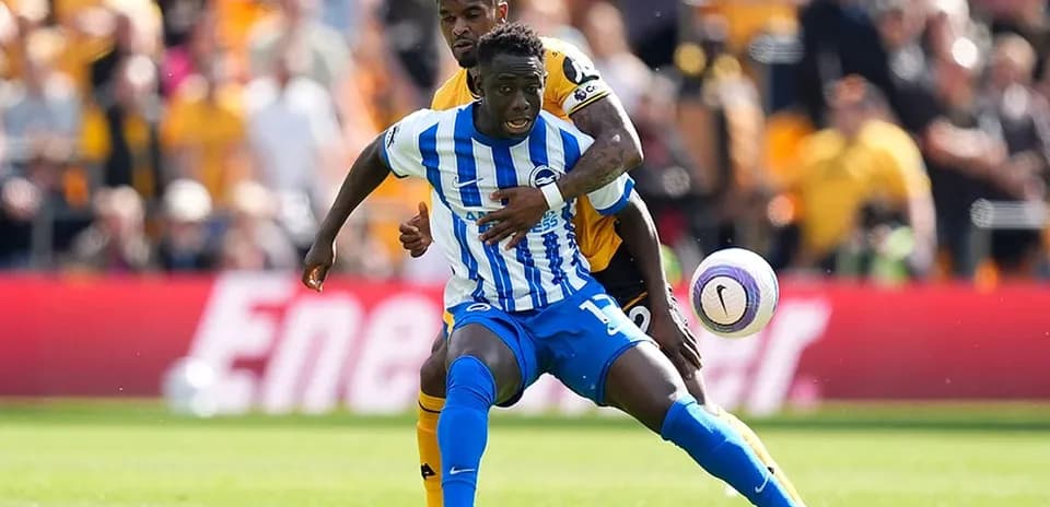 Brighton player in action against Wolves