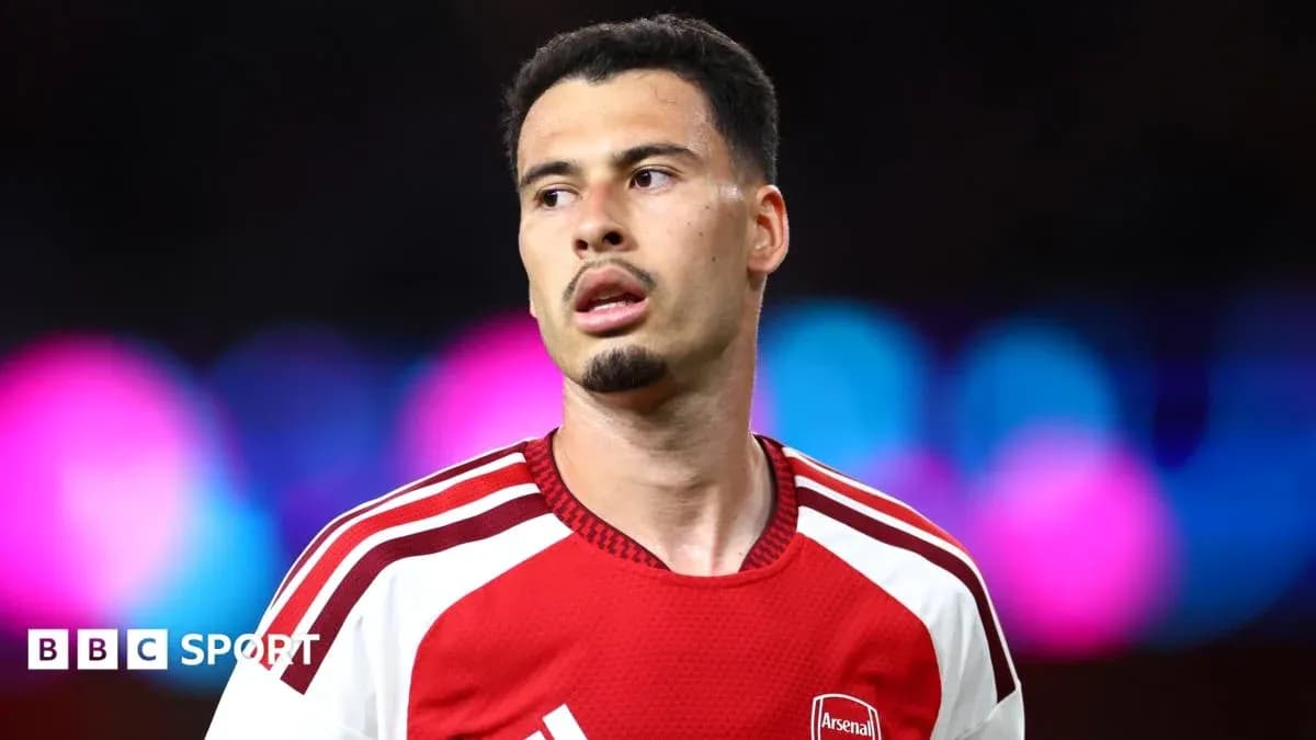 Arsenal player during match with blurred background