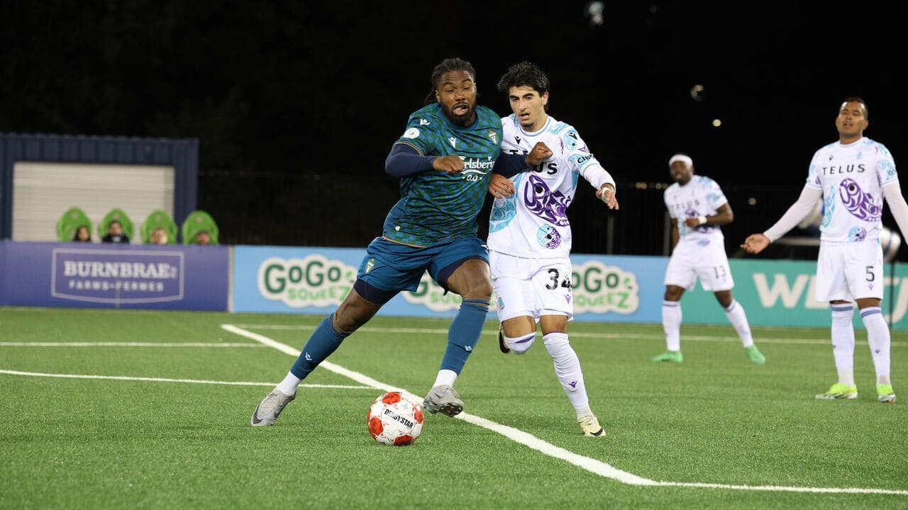 Player dribbling the ball in match action