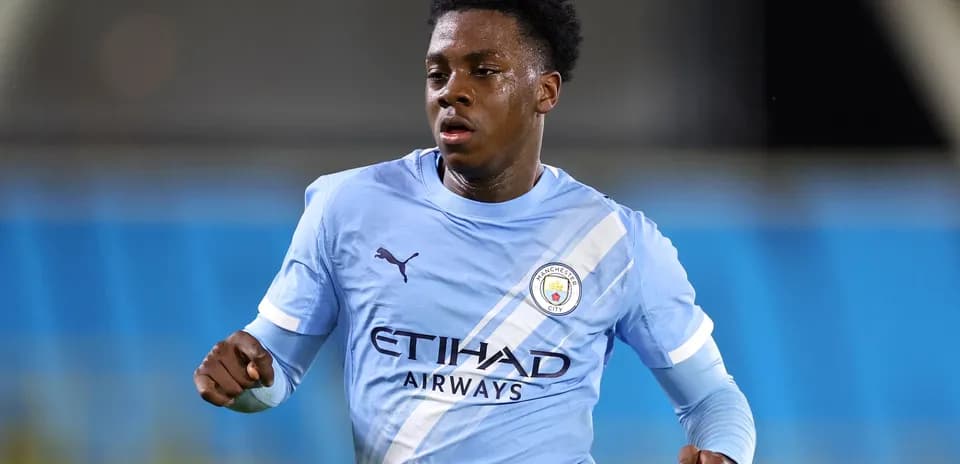 Player running in Manchester City training kit
