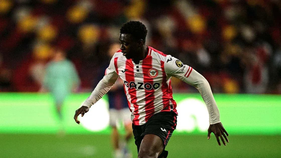 Brentford player running with the ball during match