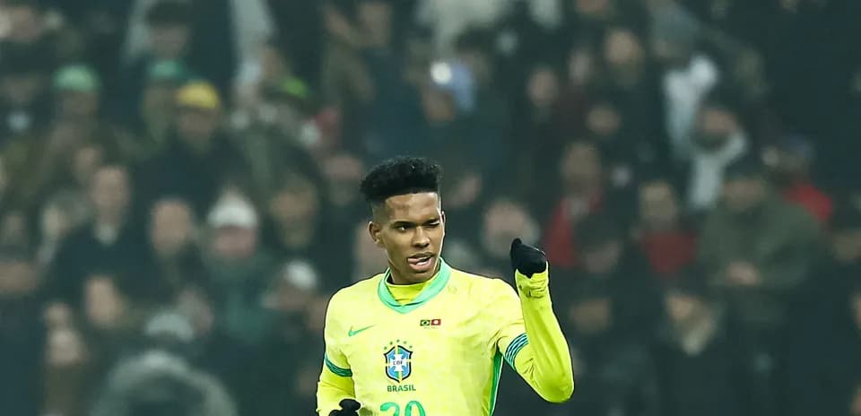Player celebrating in Brazil jersey during match
