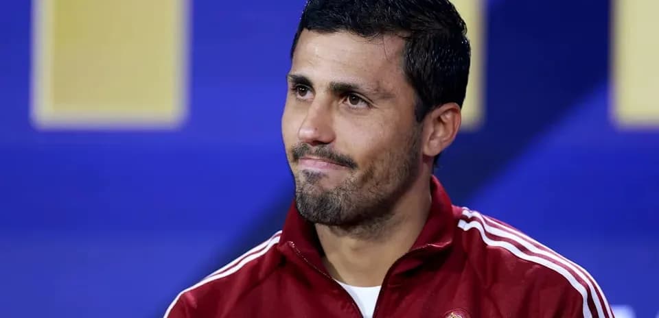 Player in Spain training kit during press conference