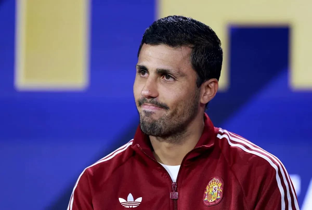 Player in Spain training kit during press conference