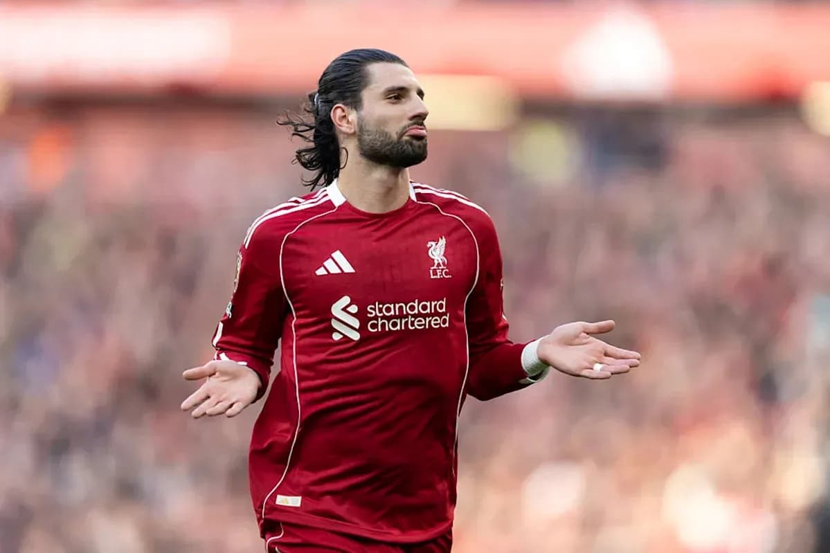 Liverpool player gesturing during a match