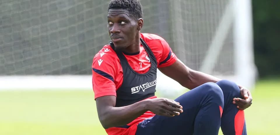 Player sitting on field during training session