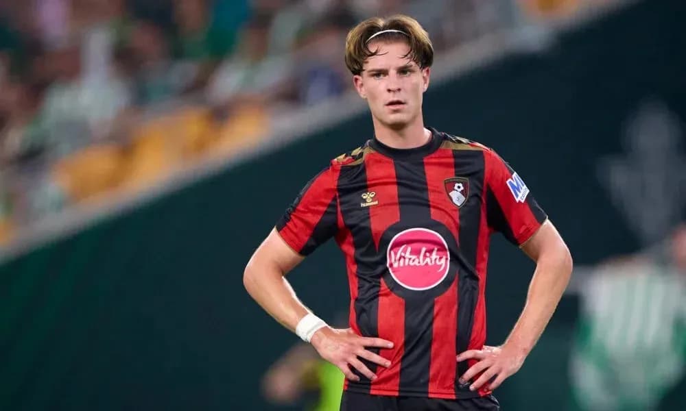 AFC Bournemouth player standing on the field