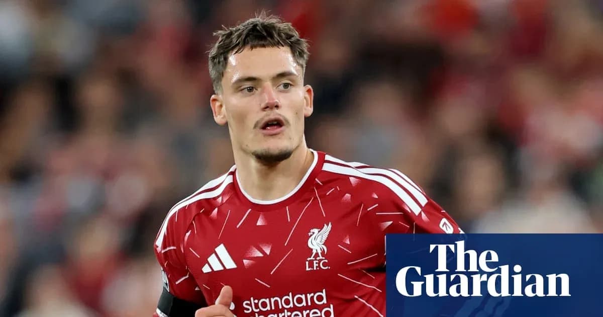 Player wearing Liverpool kit during match