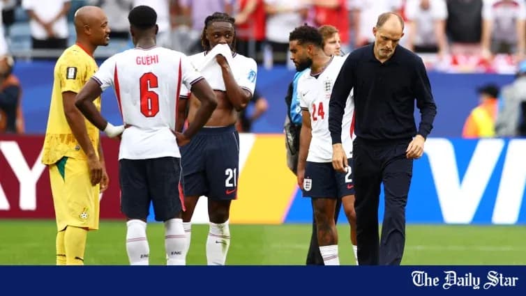 England players discussing during match stoppage