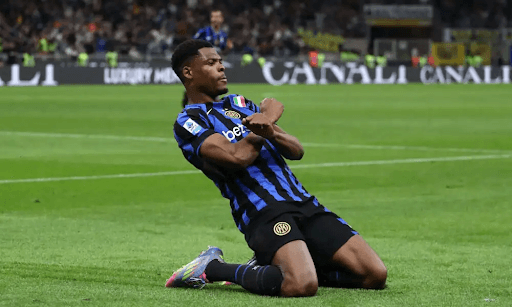 Player celebrating after scoring a goal during match
