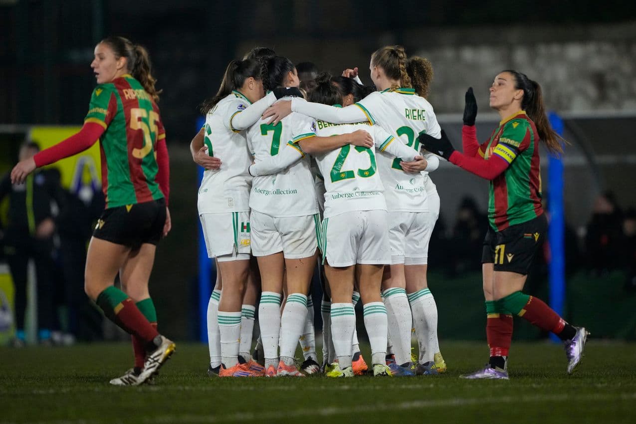 Players celebrating after scoring a goal