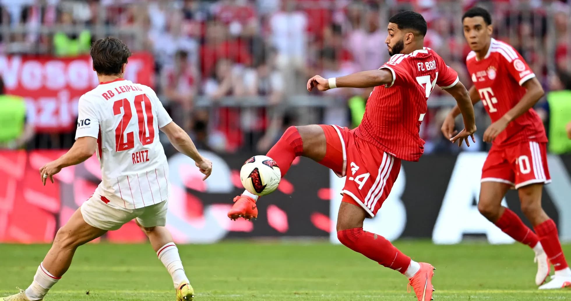 Player from FC Bayern kicking ball during match