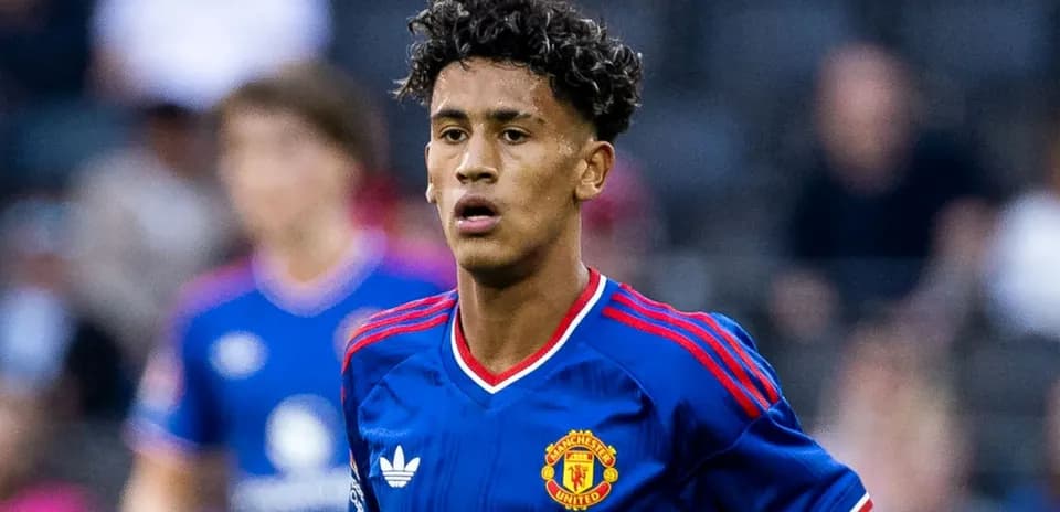 Manchester United player in blue kit during match