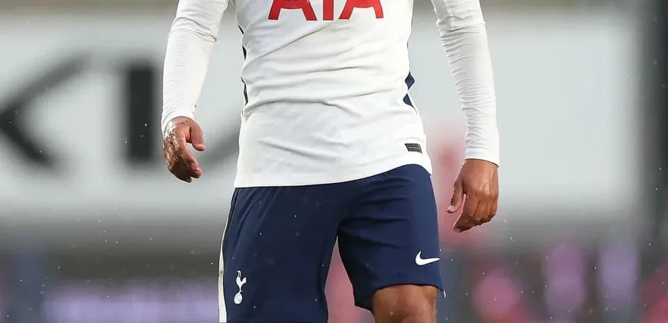 Player wearing Tottenham kit on the field