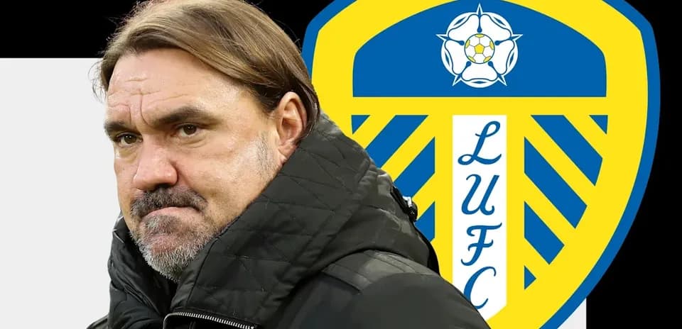 Coach with Leeds United logo in background