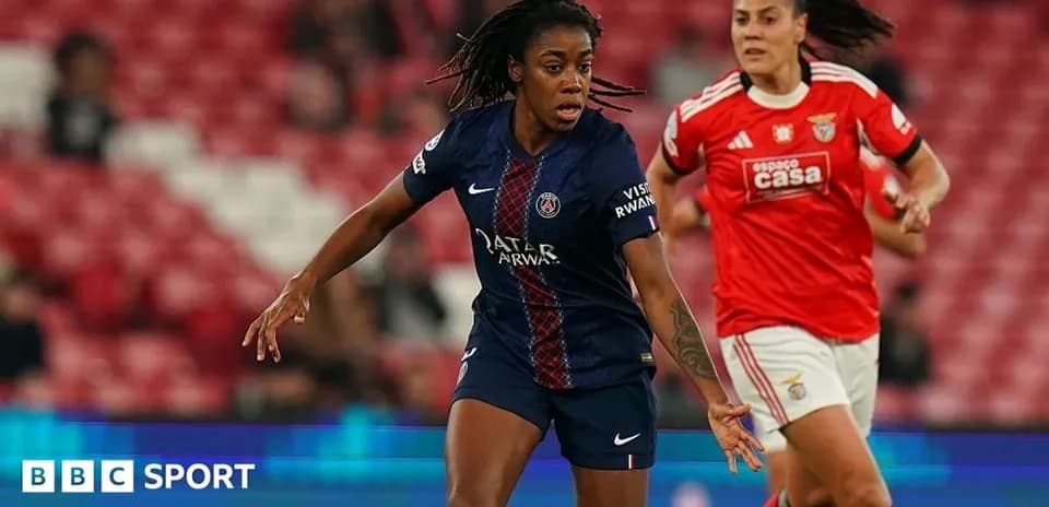 PSG player dribbling past Benfica defender during match