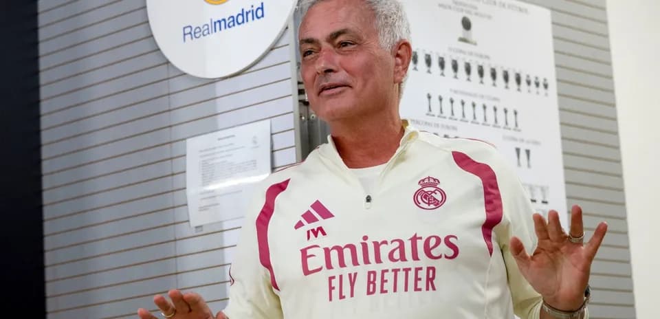 Coach speaking at Real Madrid training facility