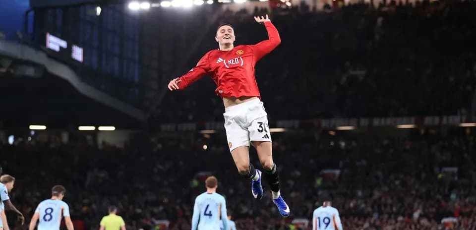 Player celebrating a goal during Manchester derby