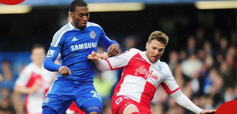 Chelsea player tackling QPR opponent during match