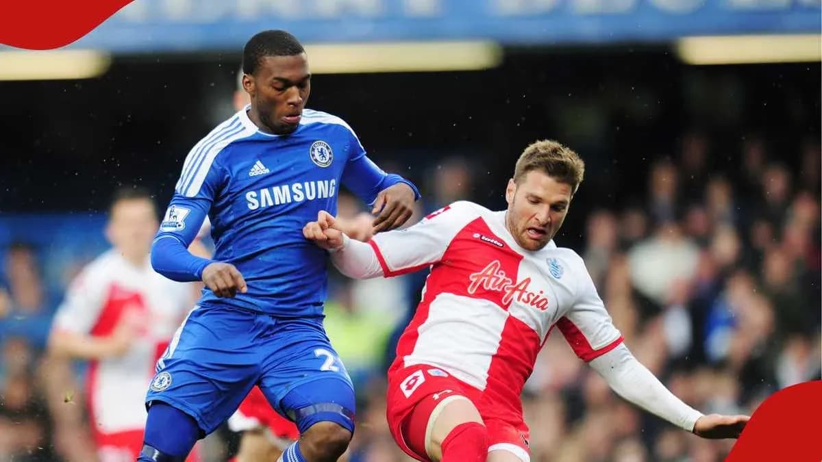 Chelsea player tackling QPR opponent during match