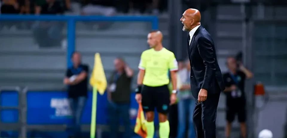 Manager shouting during match with referee nearby