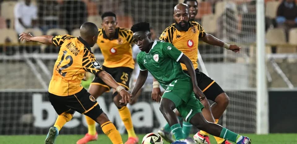 Players contesting for the ball during a football match