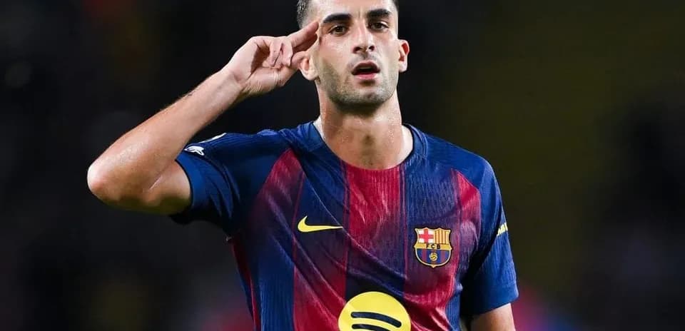 Player saluting during match in Barcelona jersey
