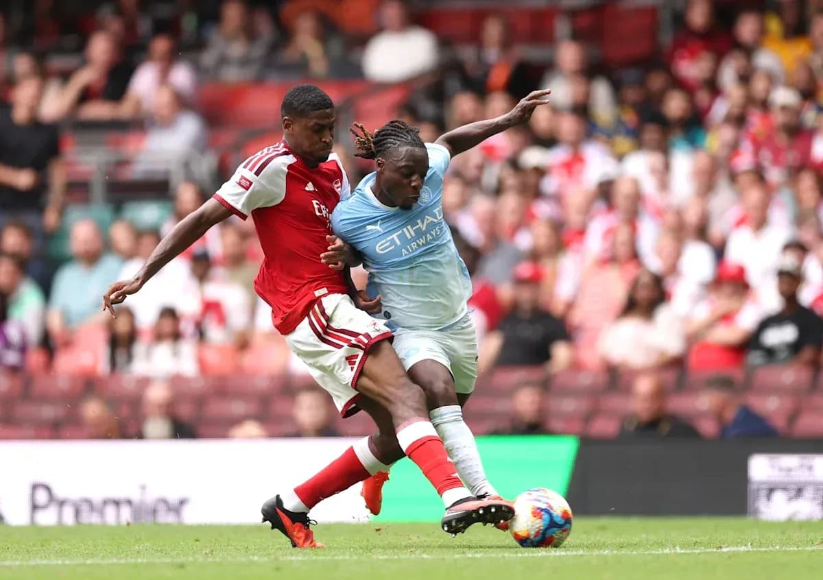Players contesting for the ball during match