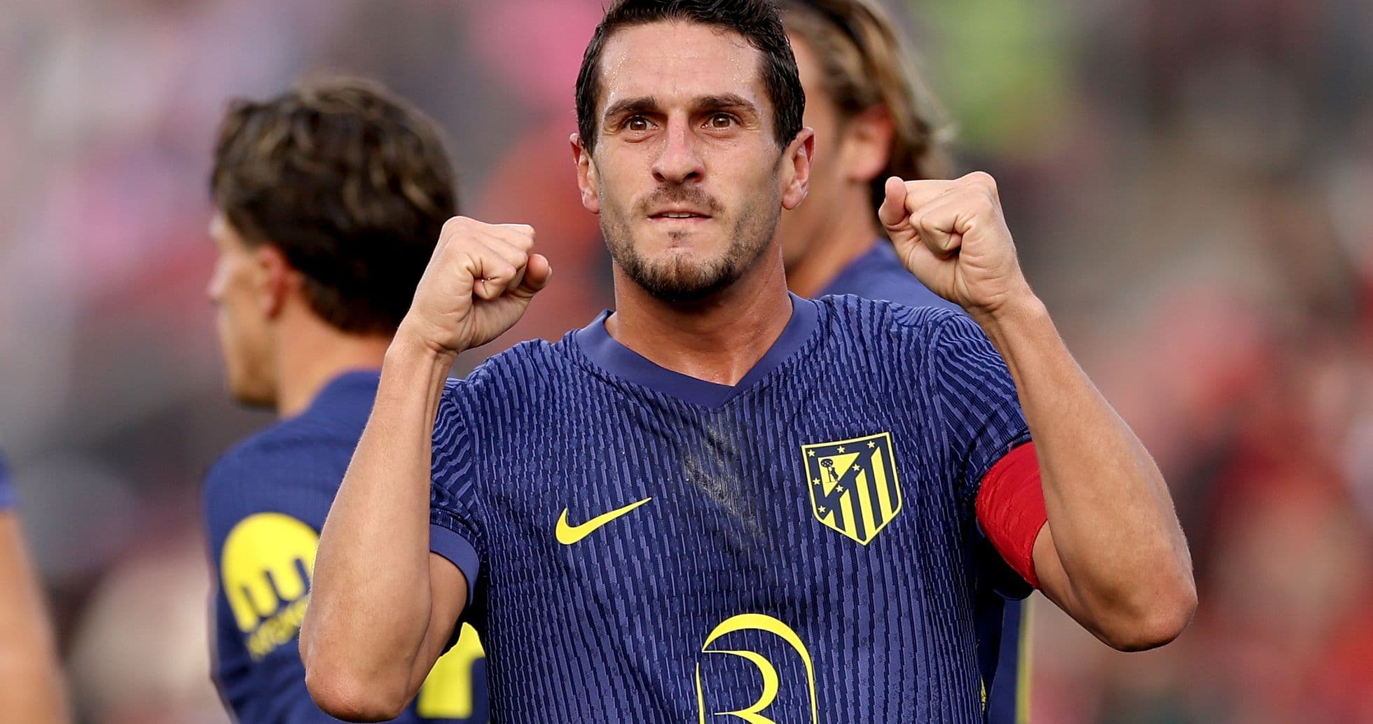Player celebrating after scoring for Atletico Madrid