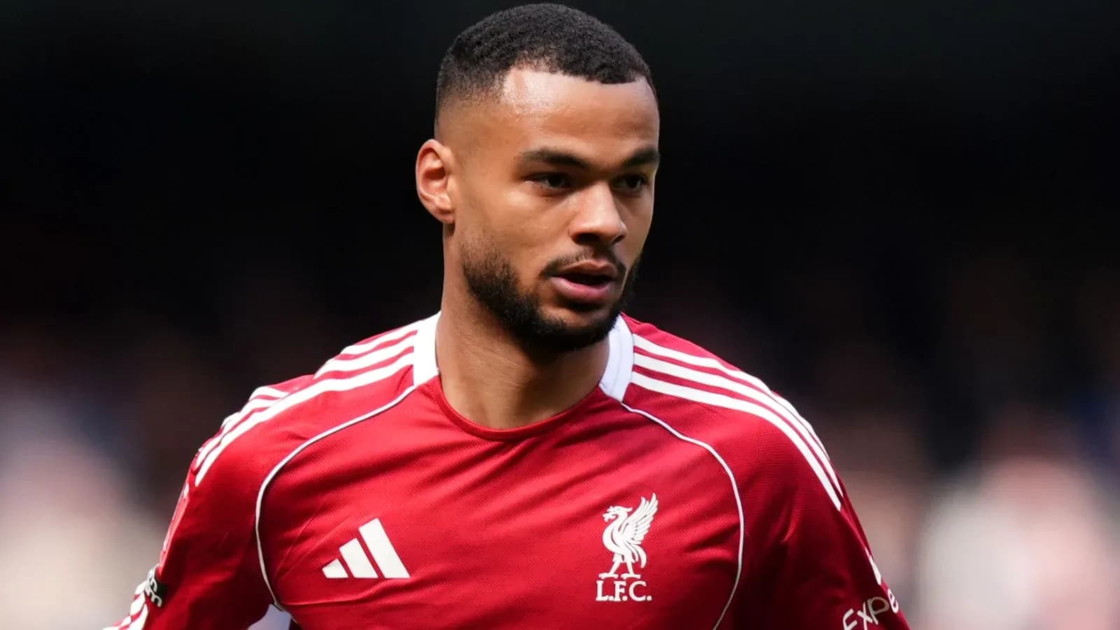 Player wearing Liverpool FC jersey during match